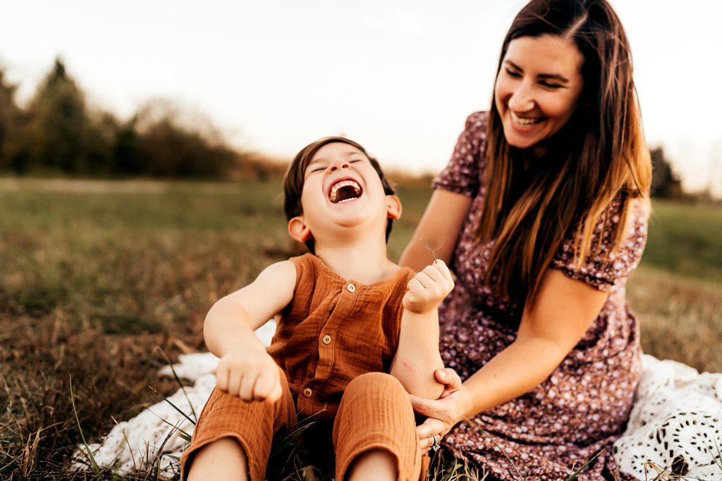 mom and son laughing taken by St. Louis Family Photographer 