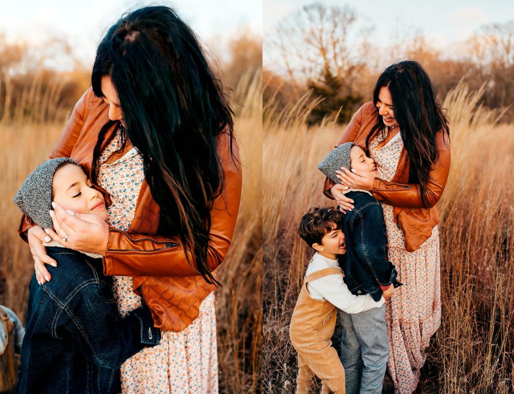 mom snuggling sons during a outdoor winter family session in St. Louis Missouri 