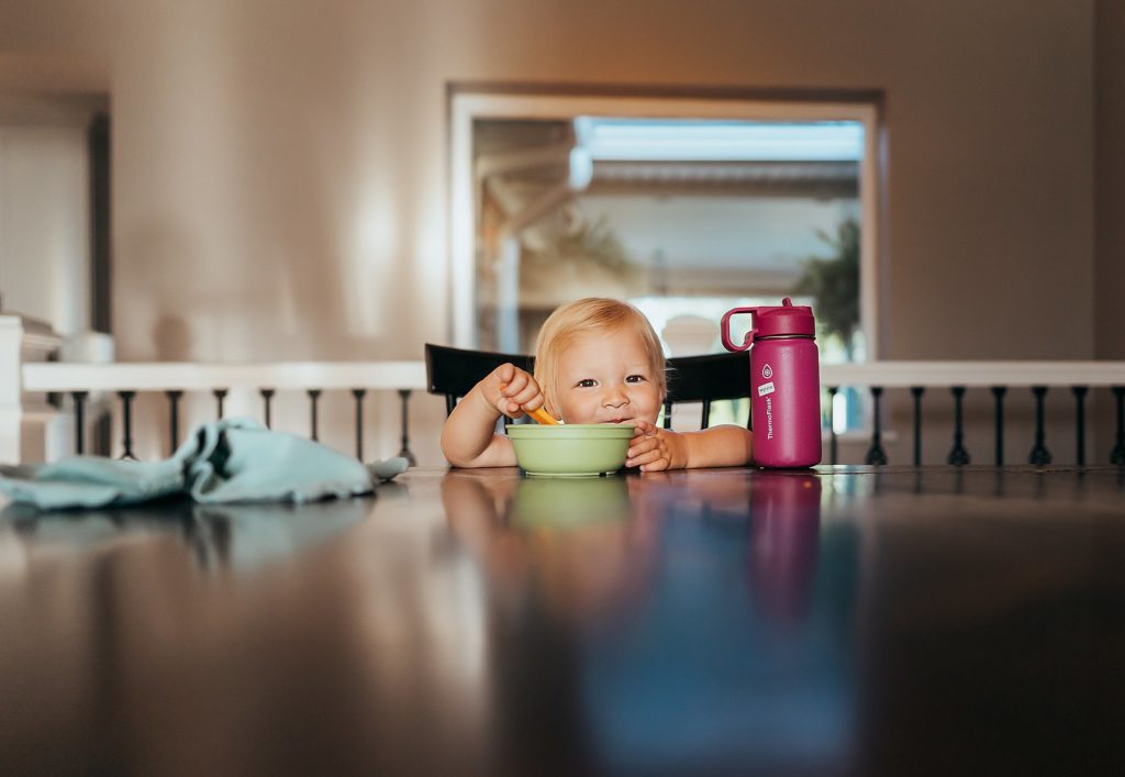 baby eating soup in a St. Louis home 