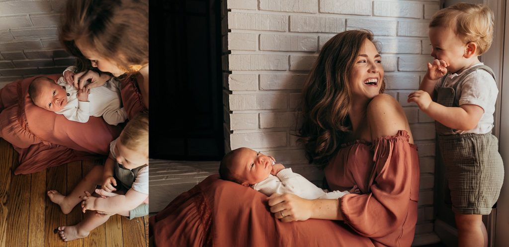 mom laughing with older son taken by St. Louis newborn photographer during a in-home session 