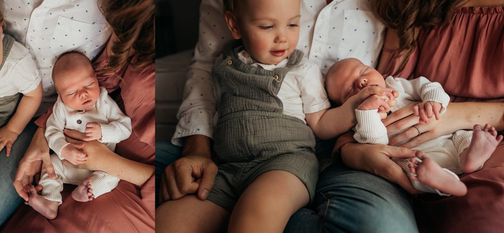 brother holding baby's house taken by St. Louis Newborn Photographer 