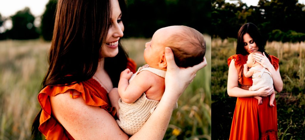 mom holding her baby boy during an outdoor newborn session 
