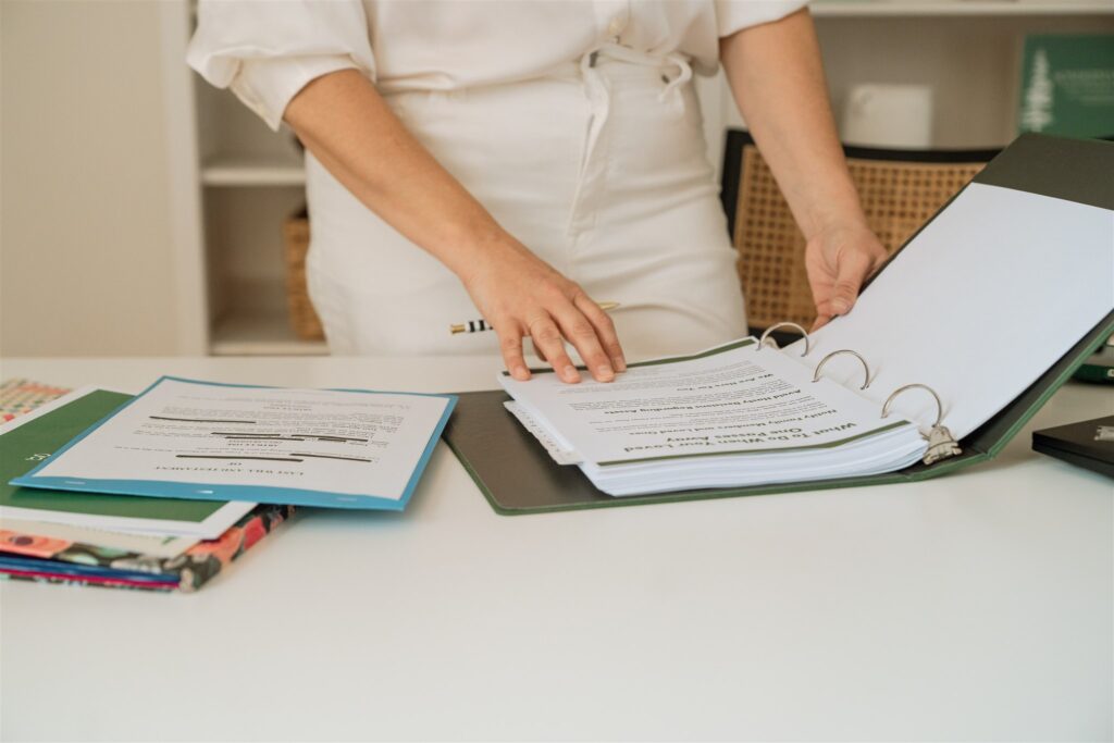 woman looking at papers 